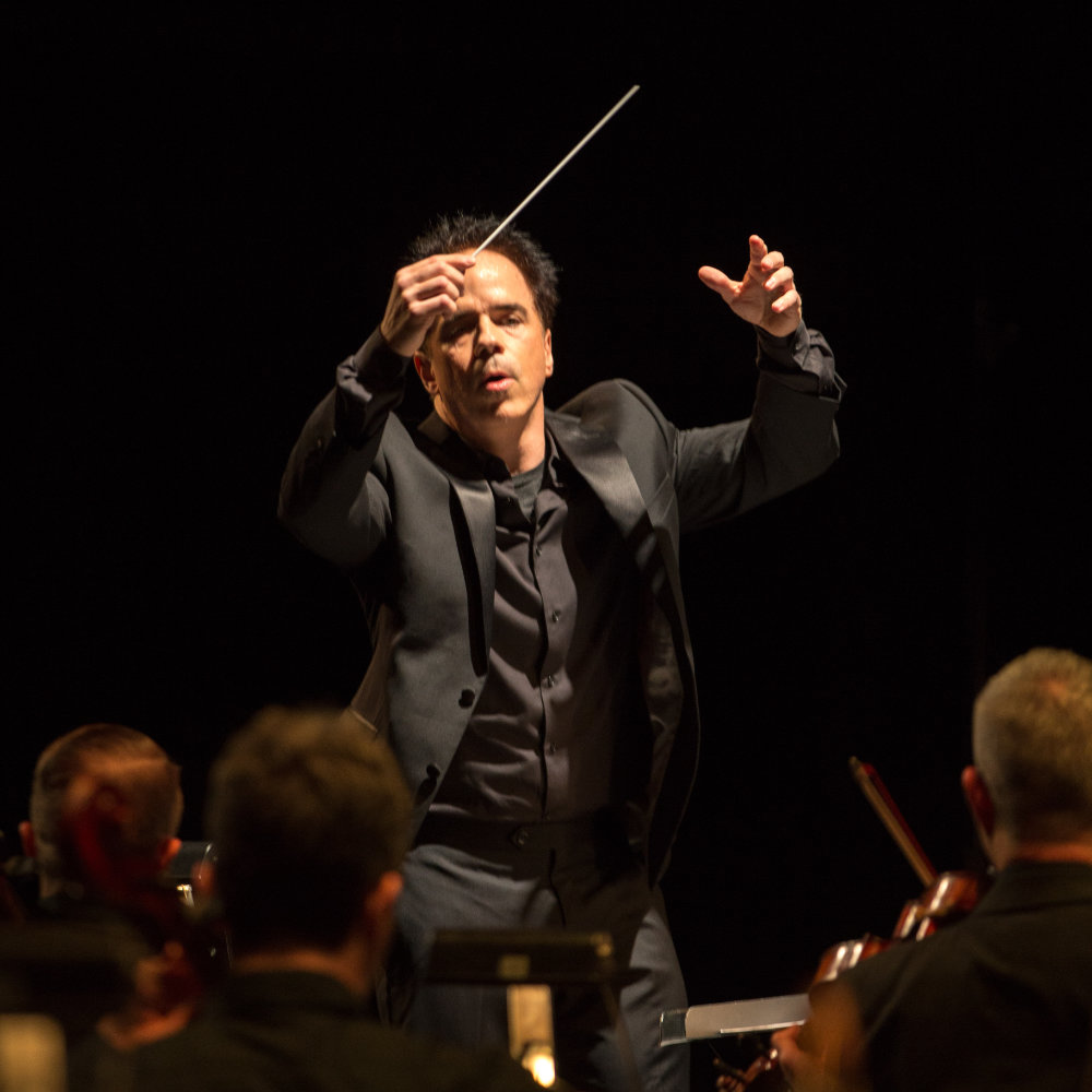 Christopher North conducting